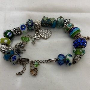 Charm Bracelet with Blue and Green beads, frogs an cross Accents